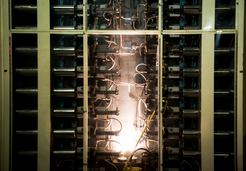 Several hydraulic rods help lock down the two 23-ton blast doors at the entrance inside of the Cheyenne Mountain Complex. The blast doors are shaped like plugs, meaning any blast would tighten their seal during an attack. (U.S. Air Force photo/Staff Sgt. Andrew Lee)